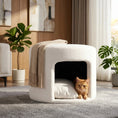 Charger l'image dans la visionneuse de la galerie, Beige pet-friendly ottoman by Home Furnishers with removable cushion and hidden pet nook, cat inside.
