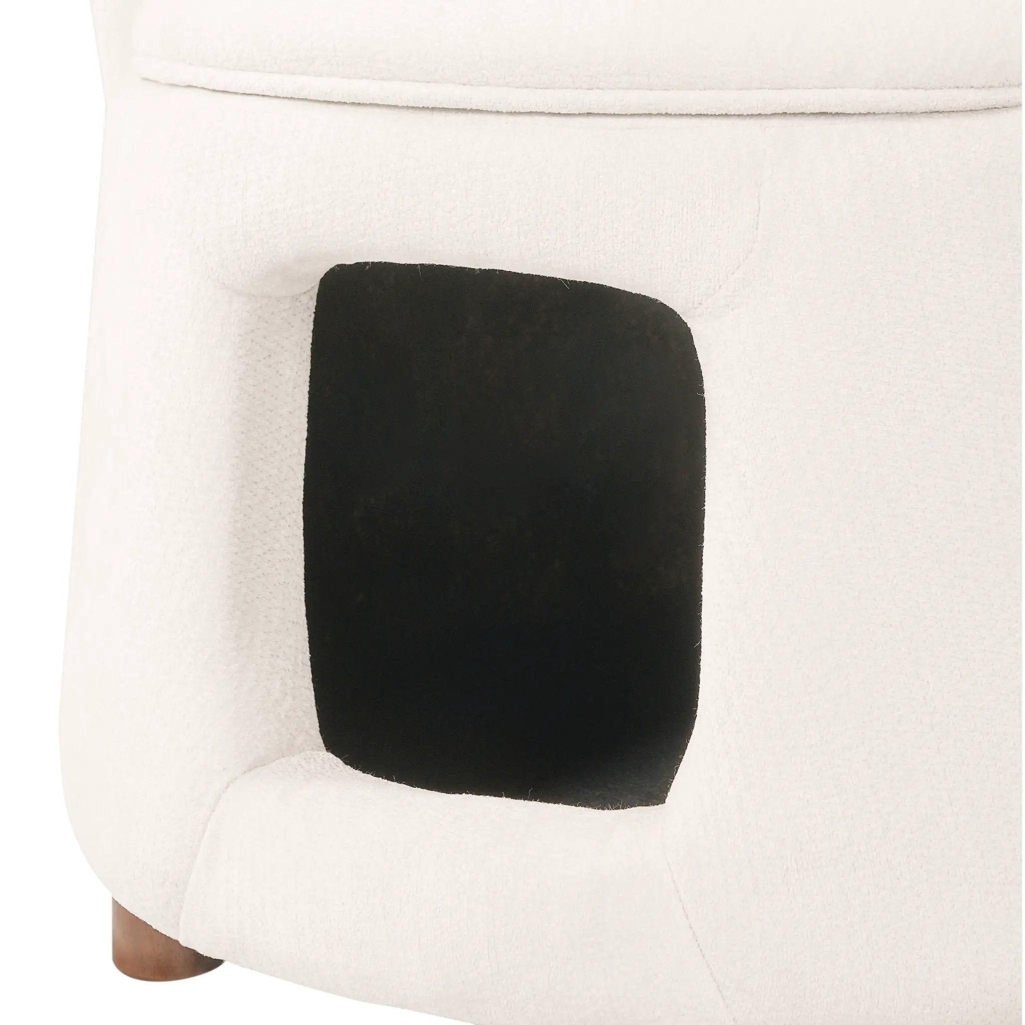 Beige fabric chair with hidden pet nook by Home Furnishers