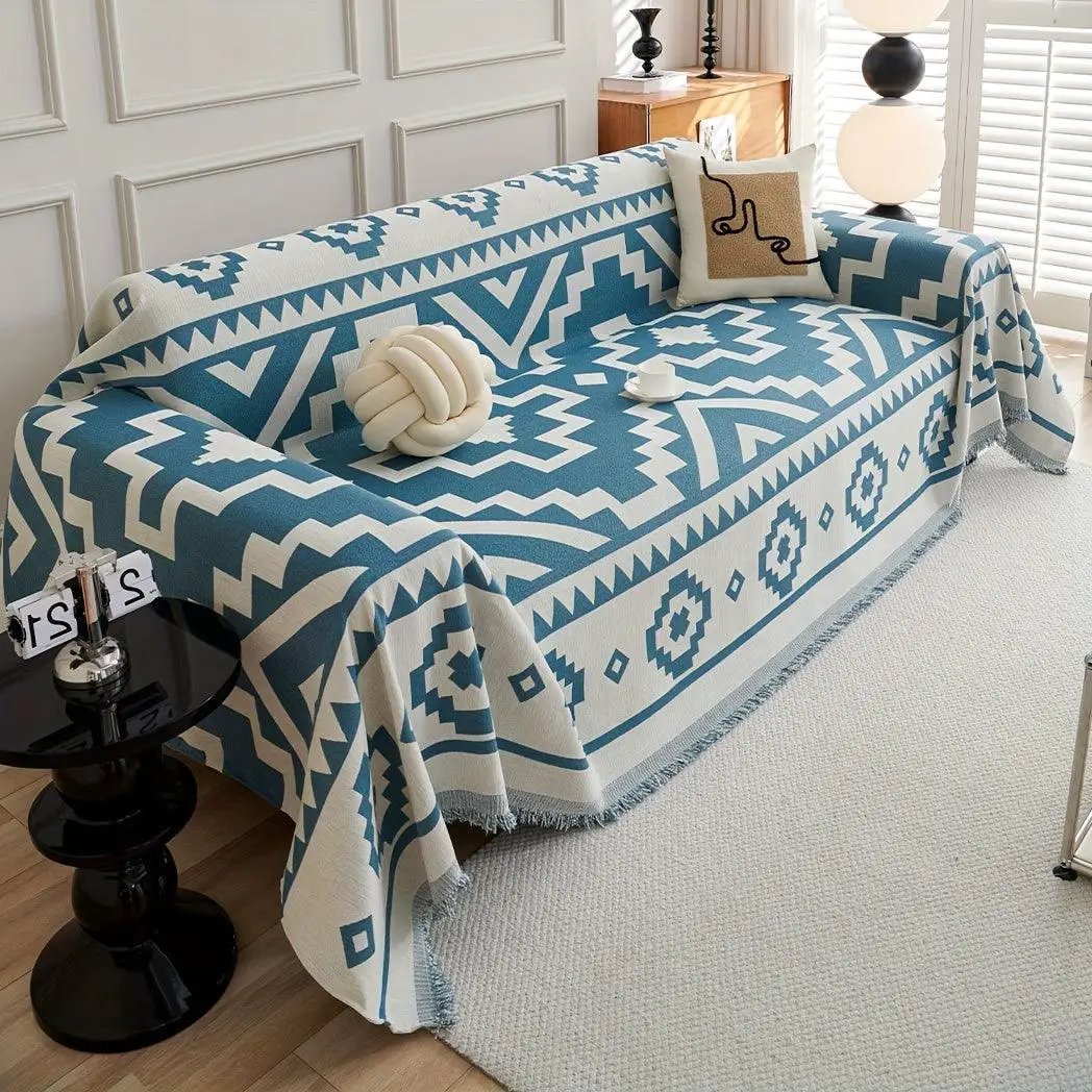 Boho-Chic All-Season Sofa Cover by topspet in blue and white geometric pattern.
