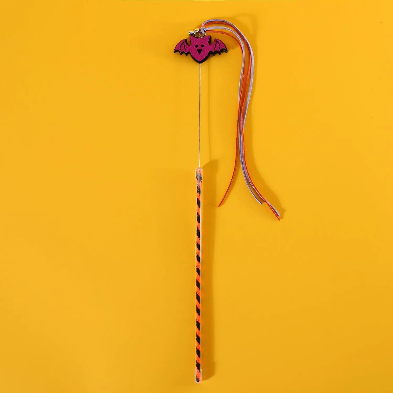 Pet Zen Halloween cat teaser wand with pink bat charm, sounding bell, and orange/purple ribbons