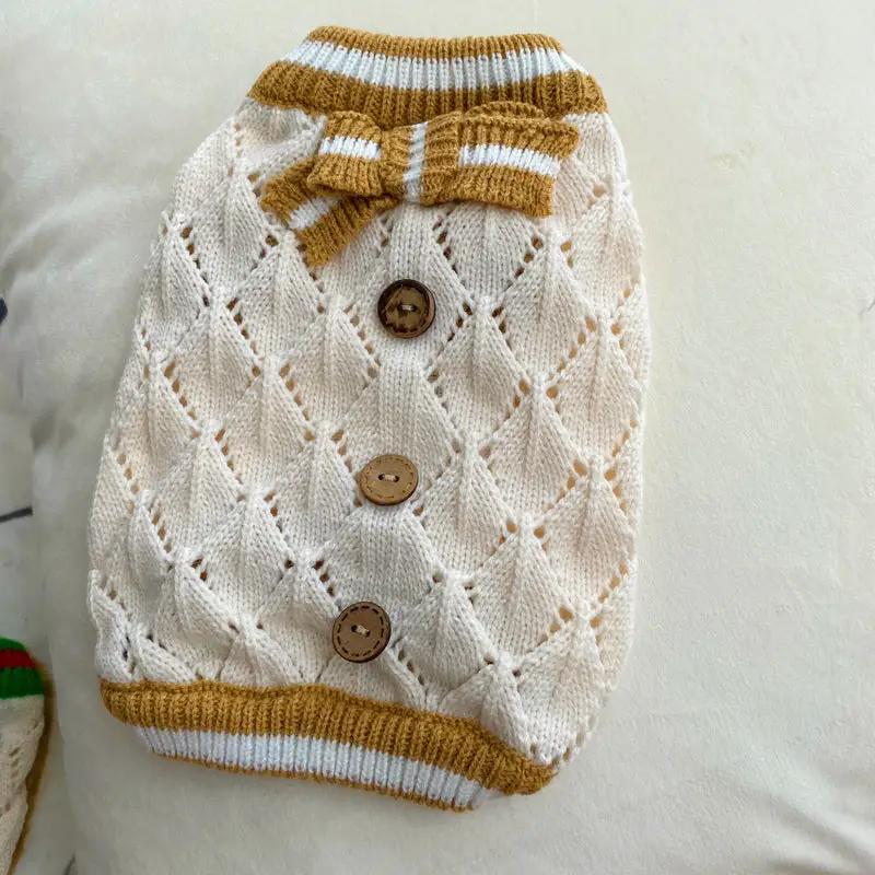 Hollow-out knitted dog sweater by Pet Zen with diamond pattern, cream knit, brown buttons