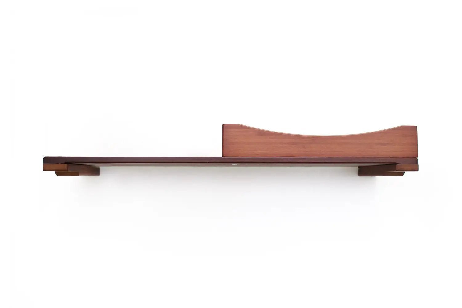 The Cat Nest Bed wooden cat shelf/bed with curved backrest on a wall-mounted walnut-finish shelf