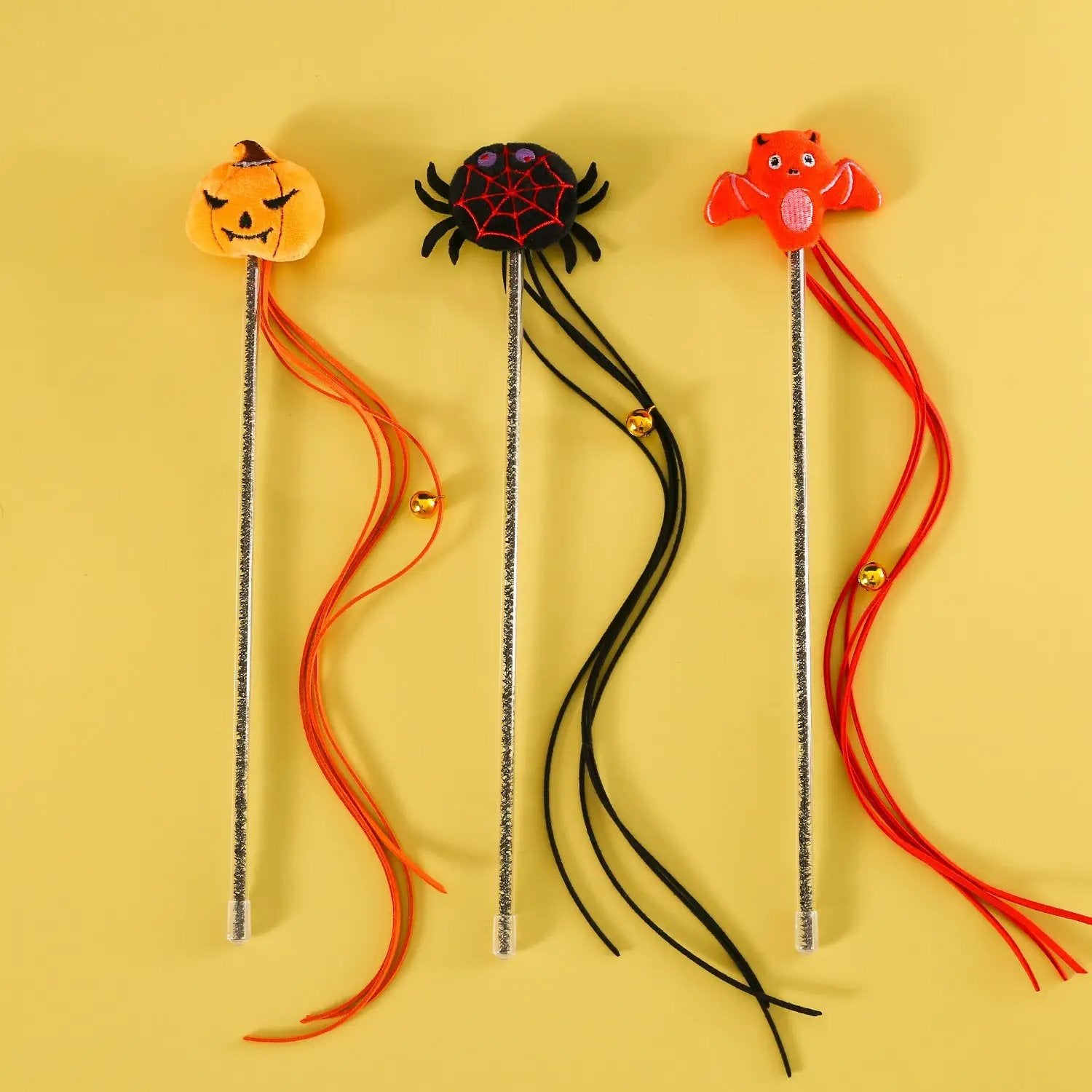 Halloween cat teaser sticks with plush pumpkin, spider, and bat toppers in orange/black (3-pack)