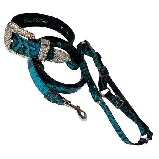 Blue and black Serpente harness set in teal snake-print with rhinestone buckles by Allysa Payne Beverly Hills