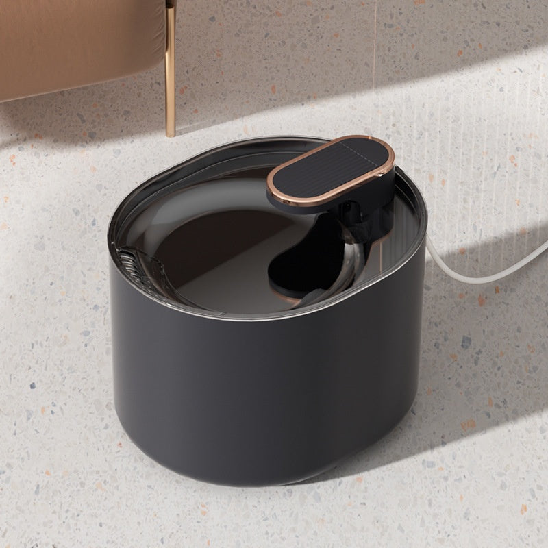 Dark blue oval fountain with low outlet