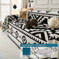 Load image into Gallery viewer, Boho-Chic All-Season Sofa Cover by topspet in light gray with a black geometric pattern; pet-proof couch protection.
