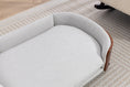 Load image into Gallery viewer, Scandinavian style elevated dog bed by Home Furnishers with solid wood legs in light gray upholstery.
