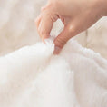 Load image into Gallery viewer, Molly Mutt couch cover; soft white plush fabric with non-slip grip
