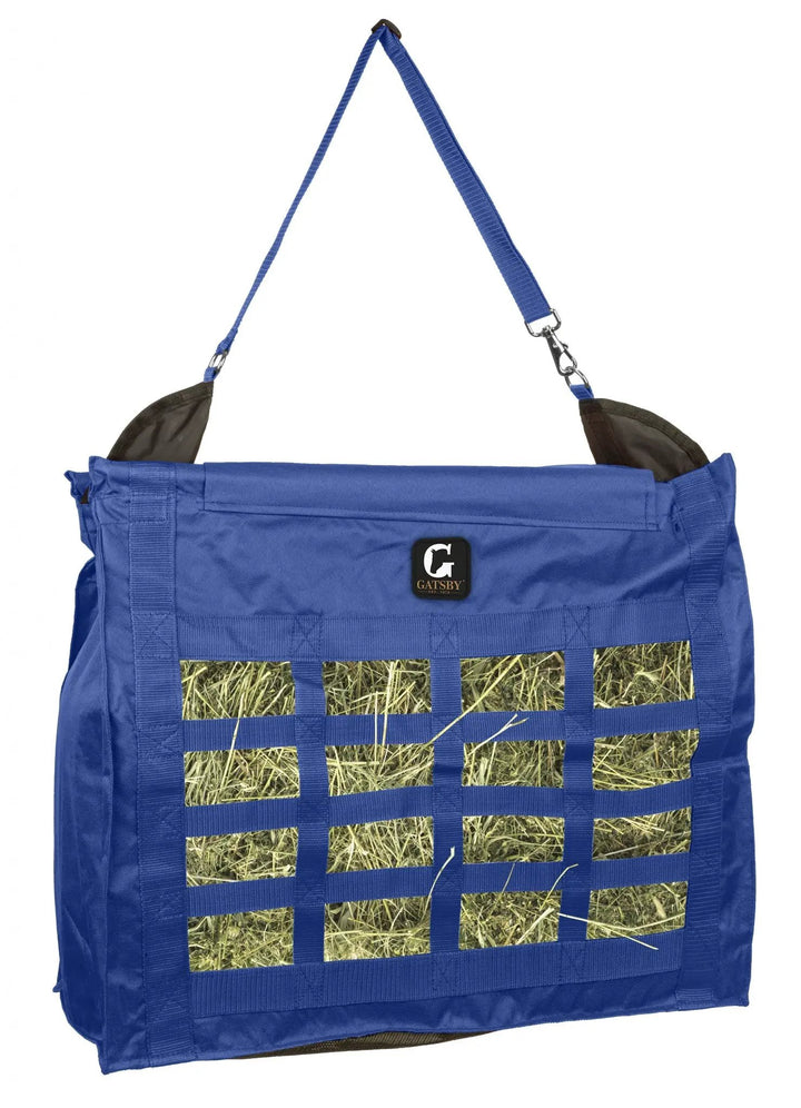 Gatsby nylon slow-feed hay bag by StateLineTack in blue with hay-window panels and adjustable strap.