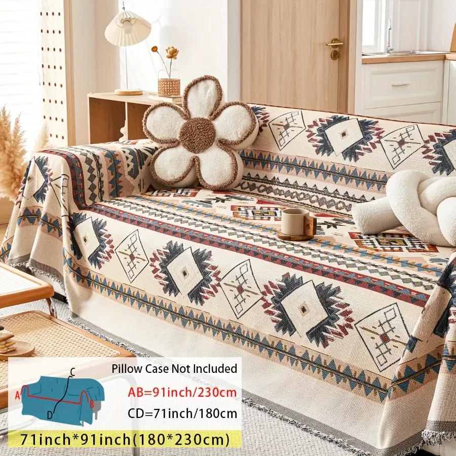 Extra Large Sofa Cover by topspet; stretchable furniture protector in beige with navy geometric pattern.