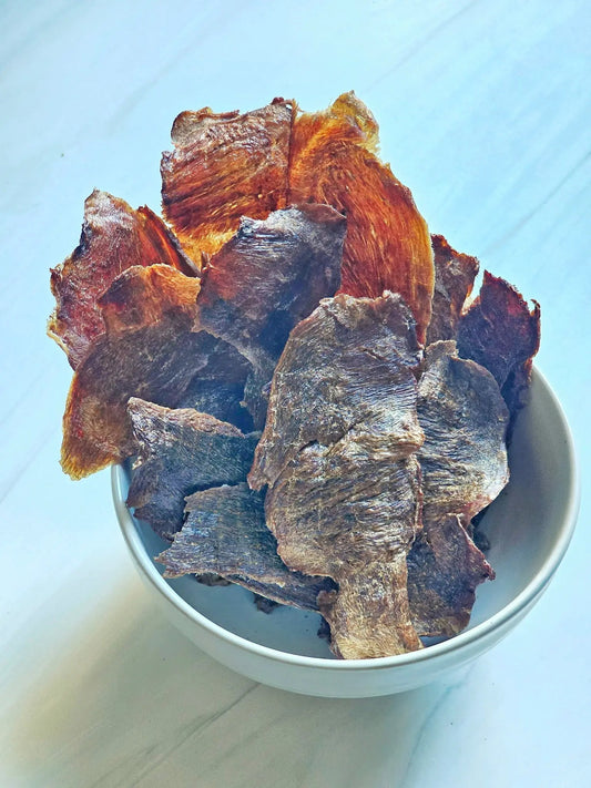 Naked Beasts Duck Breast ABF thin-cut fat-trimmed jerky slices in a bowl