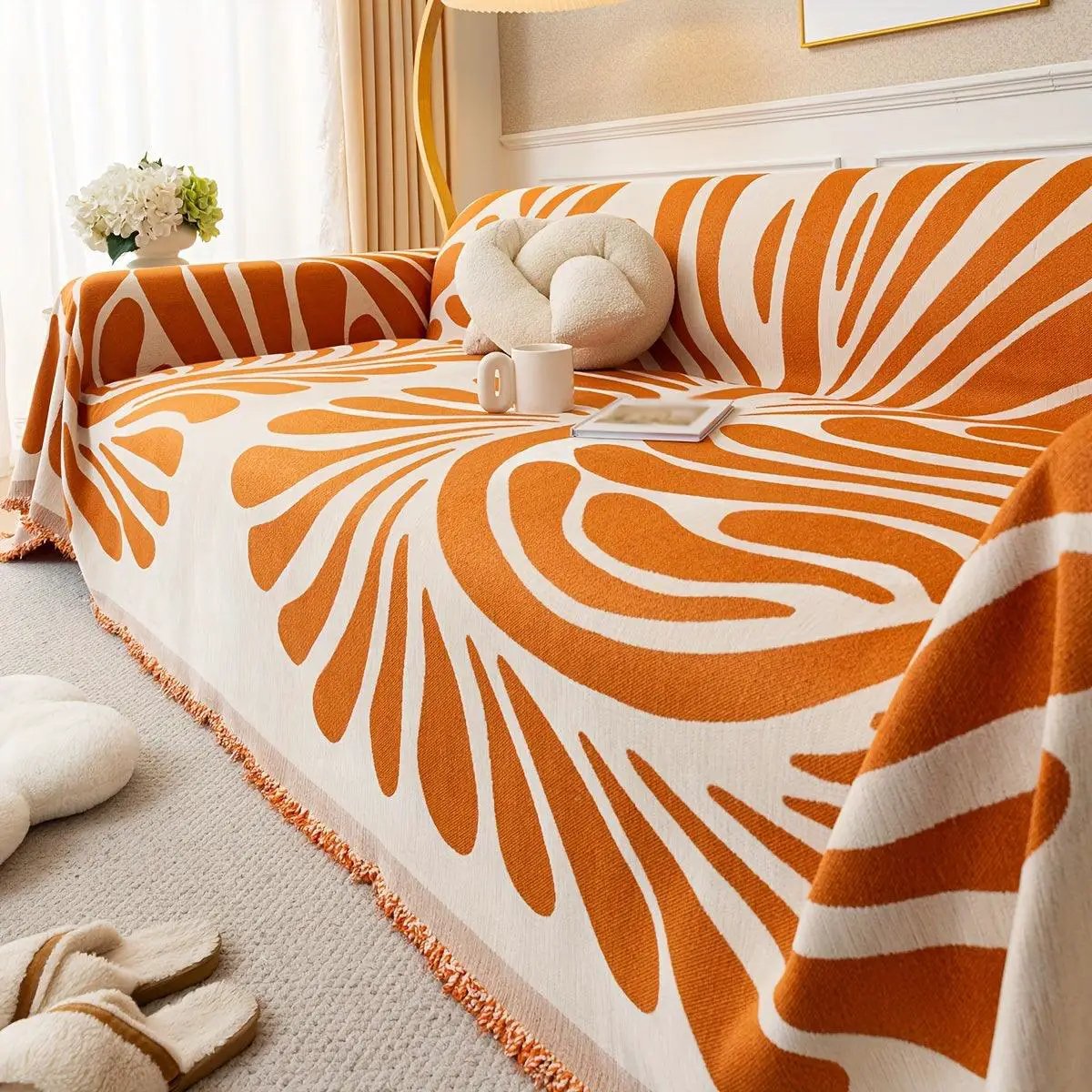 Versatile Chenille Sofa Cover in orange and white pattern; pet-friendly furniture protector by topspet