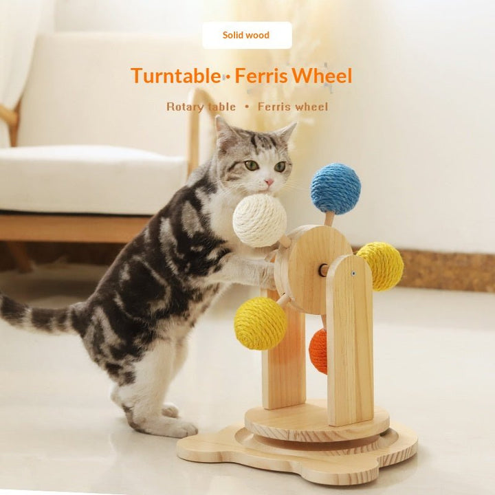 Cat beside wooden turntable scratcher
