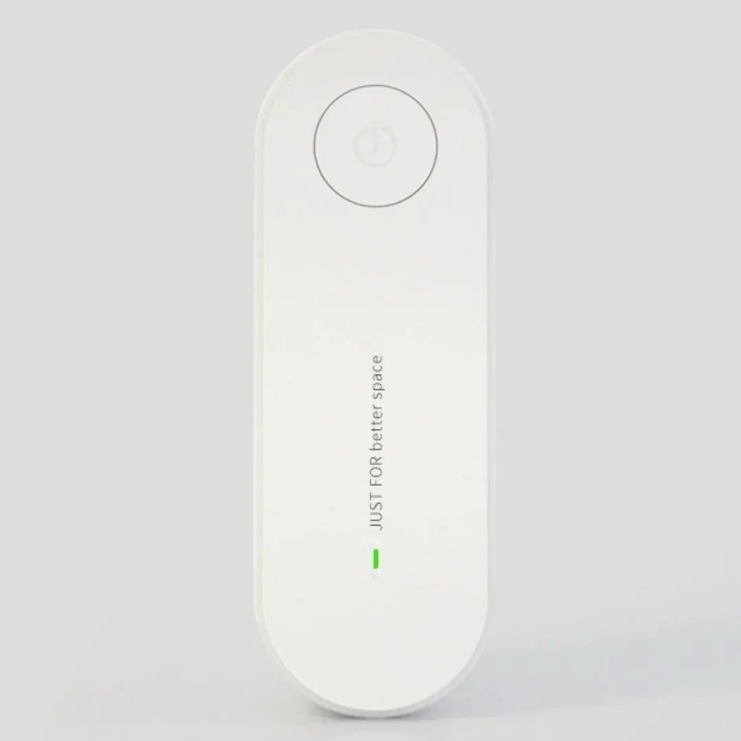 Ultrasonic Mite & Mosquito Repeller For Pets by Pet Zen, white compact device with circular power button
