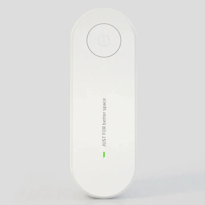 Ultrasonic Mite &amp; Mosquito Repeller For Pets by Pet Zen, white compact device with circular power button