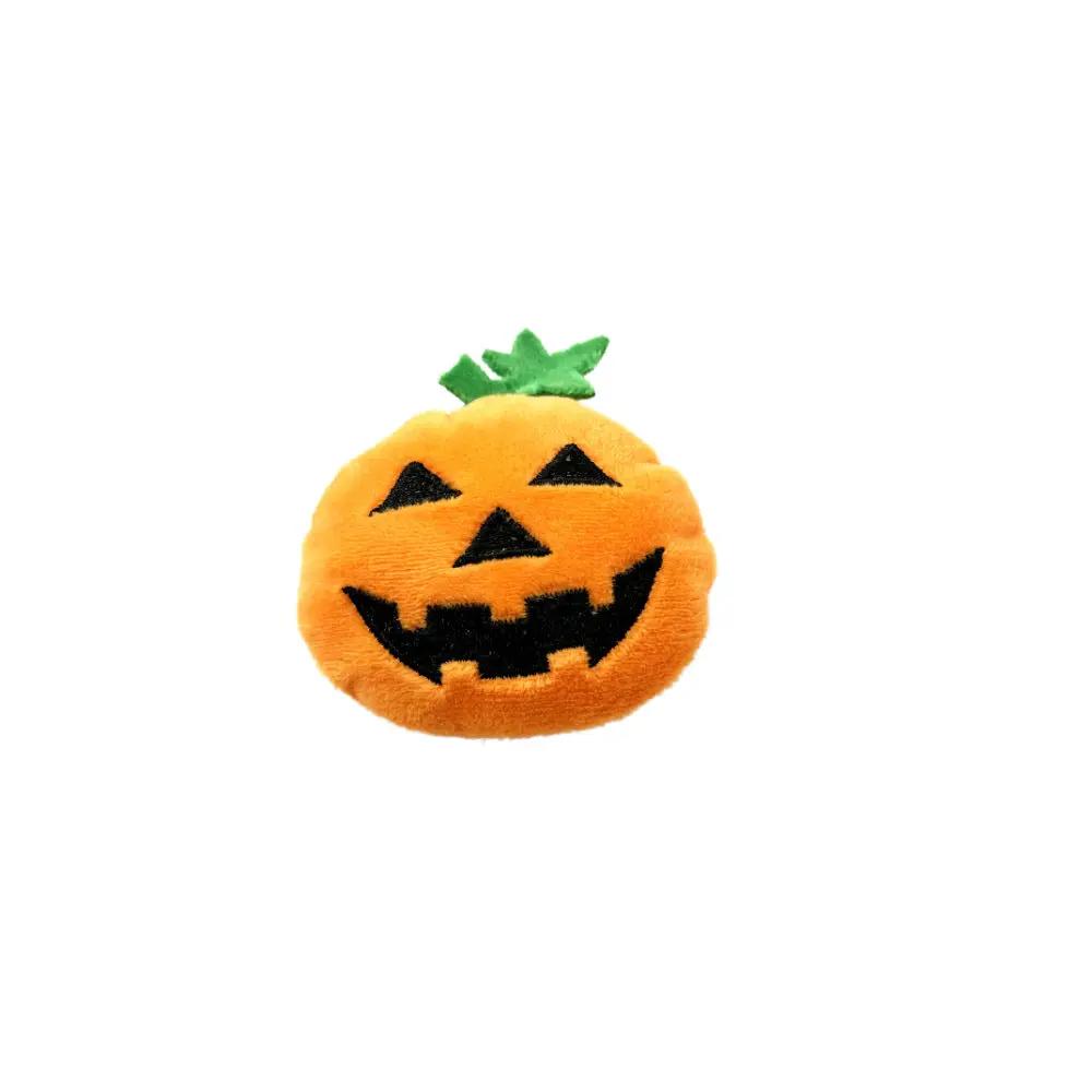 Pumpkin-shaped plush cat toy with jack-o'-lantern face, green stem, orange color.