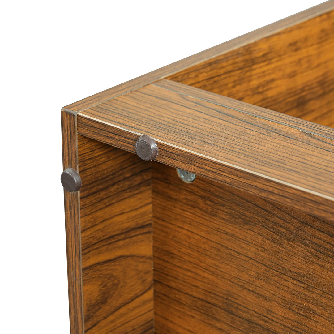 Close-up of round floor pads and corner hardware on the underside of The Curator Cat Bookshelf in Brown