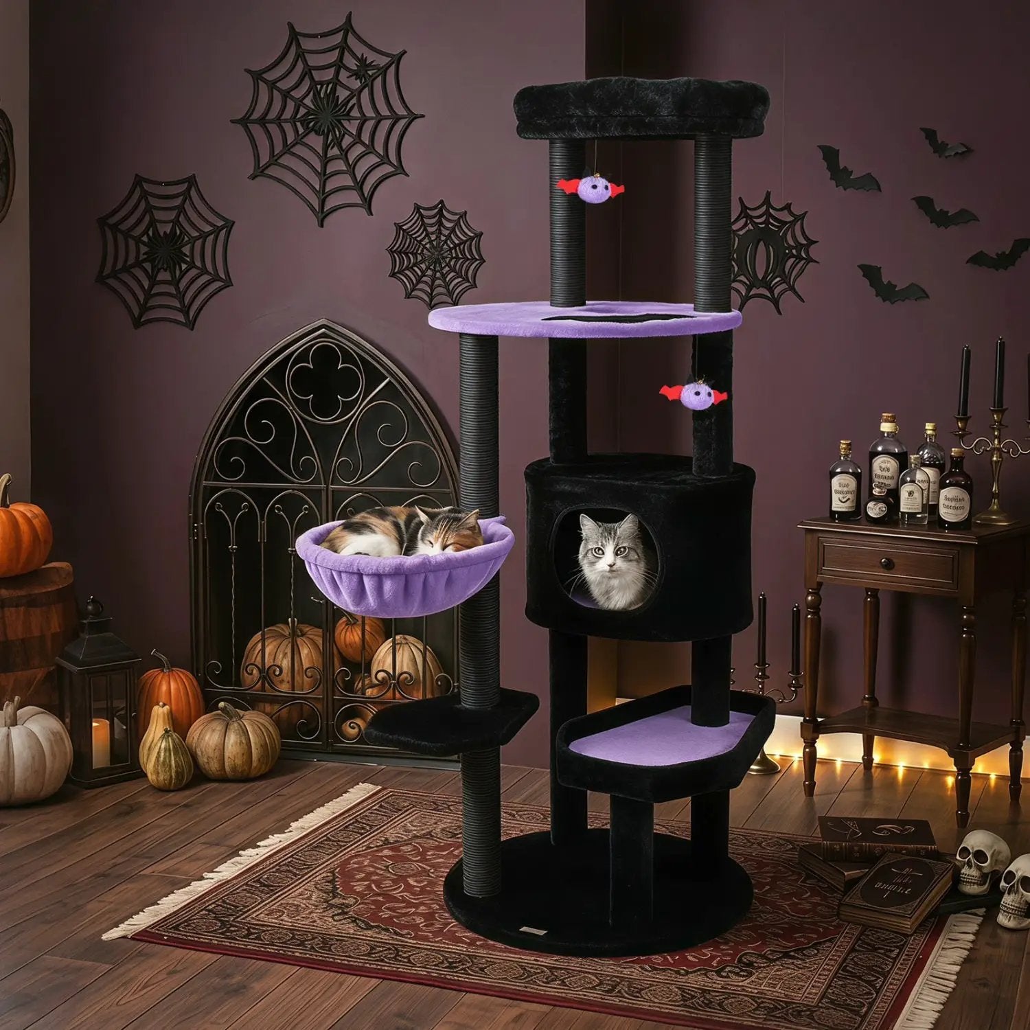 60-inch Gothic Cat Tower by DirectDeals with plush purple platforms and hanging toys; 2 cats.