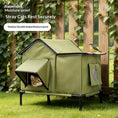 Cargar la imagen en la vista de la galería, Pet Zen outdoor cat bed in olive green with a legged frame and side window, cat peeking out

