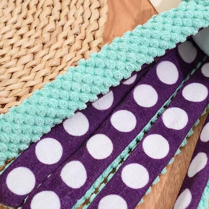 Textured mint fabric and purple polka-dot underside