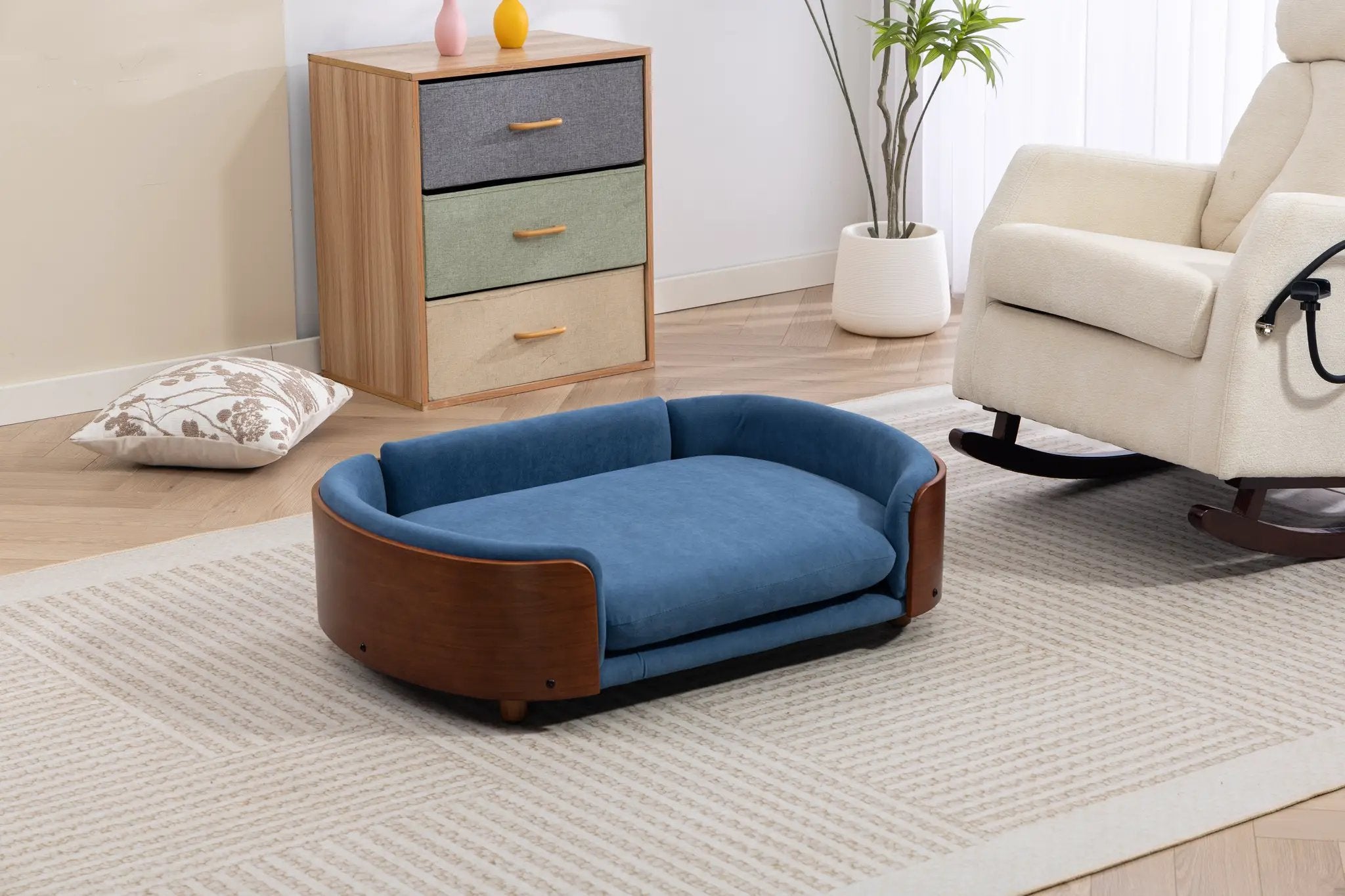 Scandinavian Style Elevated Dog Bed with blue cushion and wooden frame