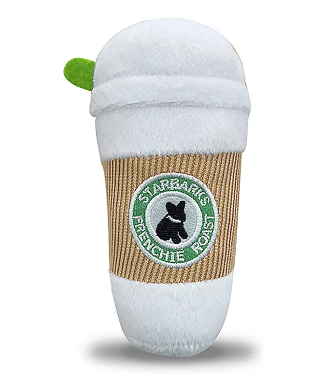 Puppaccino dog toy by For Animals, With Love; plush coffee cup with white top and bottom, tan sleeve, green leaf tag.