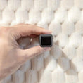 Load image into Gallery viewer, Plush Nordic Sofa Slipcover gray square object held in hand
