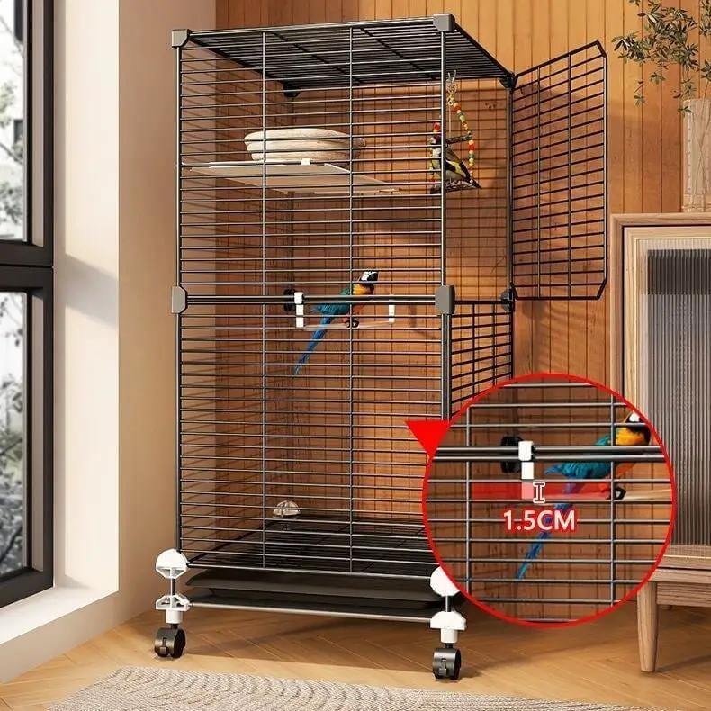 Large black rolling bird cage with perches, feeding bowls and removable tray on wheeled stand; two birds inside.