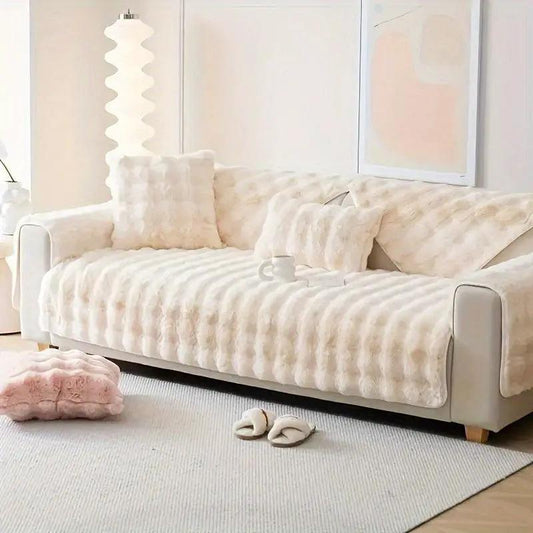 White couch slipcovers by topspet in plush, winter-warm fabric on a white sofa