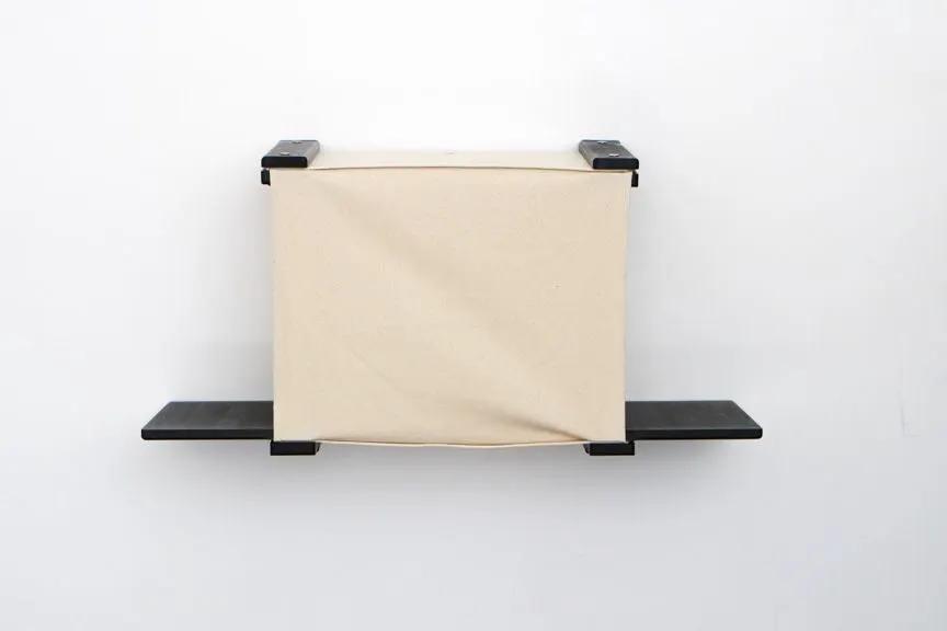 Cat Cubby for Wall - Covered Cat Bed, beige fabric cube with black metal brackets.