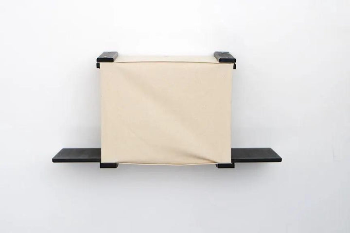 Cat Cubby for Wall - Covered Cat Bed, beige fabric cube with black metal brackets.