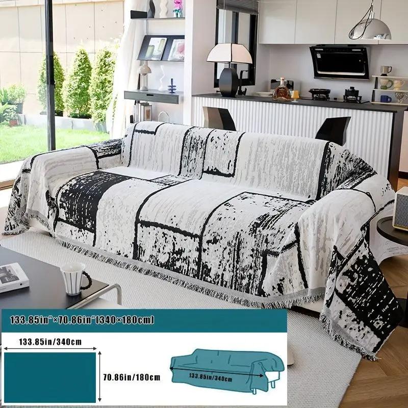 Luxury pet sofa cover by topspet; white with bold black abstract pattern, non-slip and machine washable.