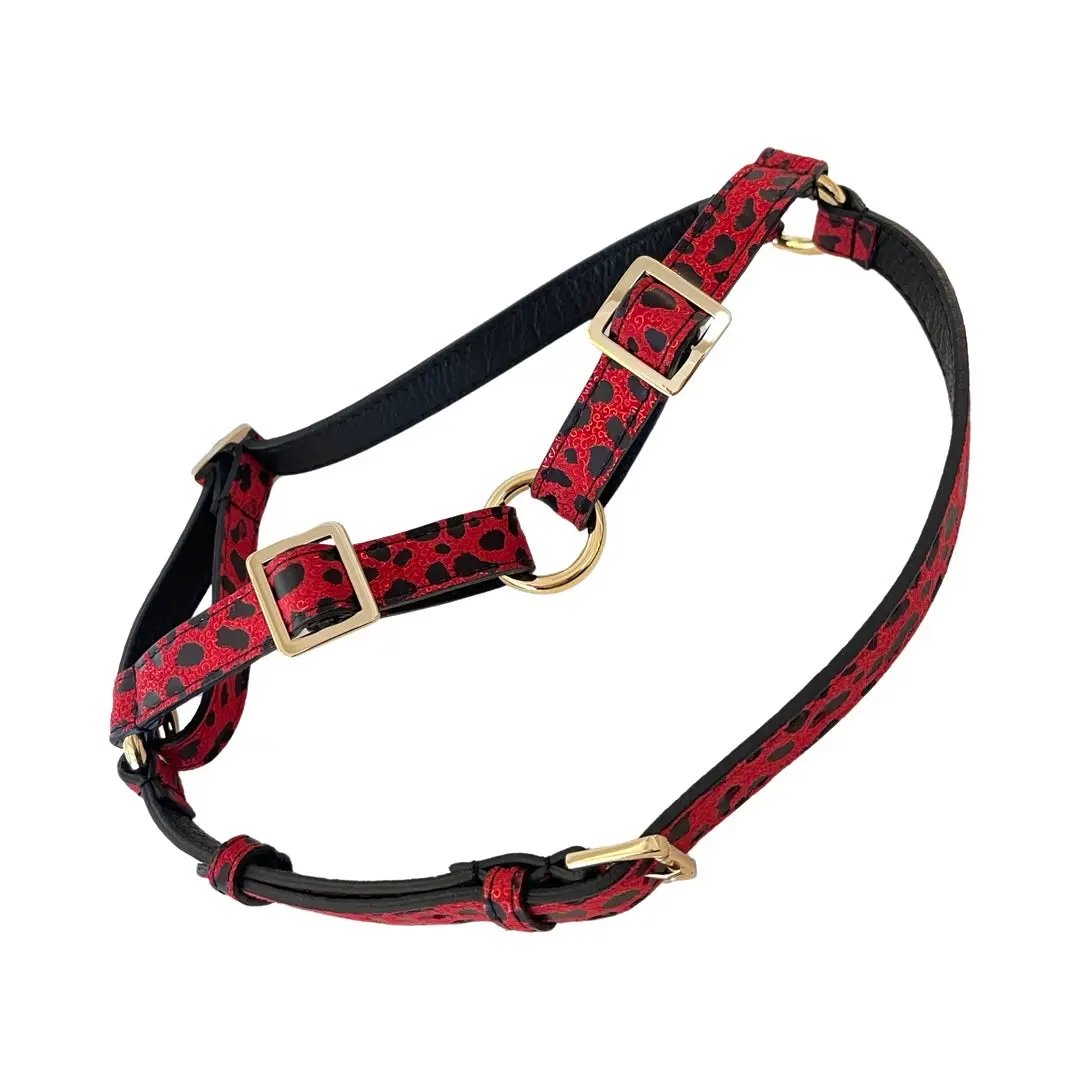 Red & Black leopard-print Italian leather harness with gold-tone hardware and adjustable straps.