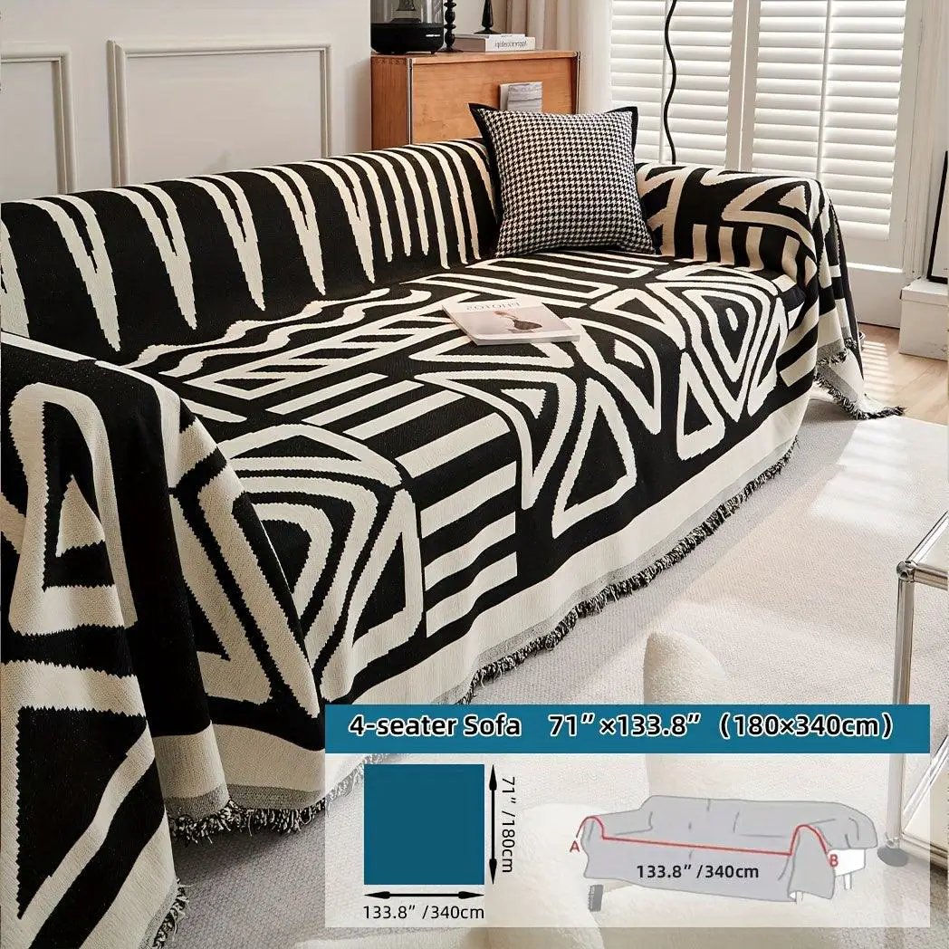 Bohemian-style chenille couch cover for 4-seat sofa in bold black-and-white geometric pattern, anti-dog-scratch fabric.