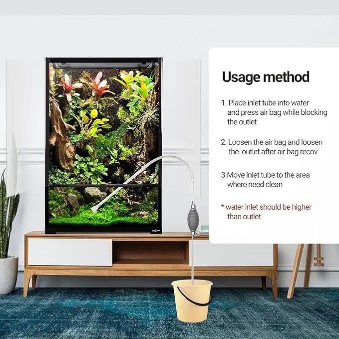 REPTIZOO 67-Gallon glass reptile terrarium on a wooden stand with live plants and a siphon cleaner.