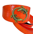 Cargar la imagen en la vista de la galería, Orange 3-inch wide 2-piece collar and leash set with green rhinestone alligator emblem on textured snakeskin
