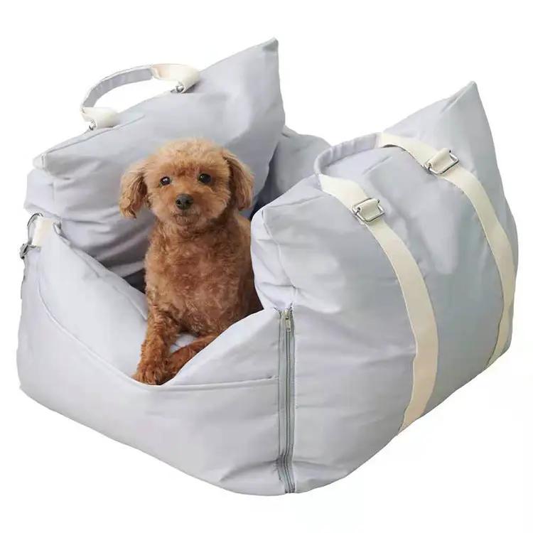 Outbound Travel Portable Car Pet Nest in light gray with beige straps and handles.