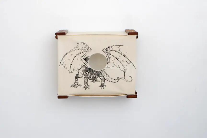 Enclosed Cat Bed - Cat Wall Cubby by Catastrophic Creations, beige canvas with dragon print and dark wood brackets