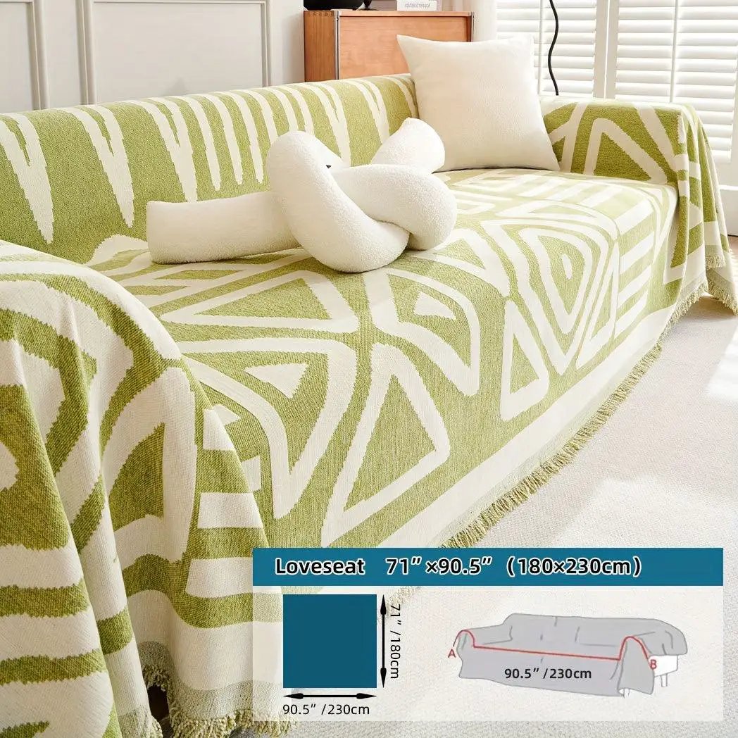 Bohemian chenille couch cover in green and white with fringe trim, extra-long 71x90.5 in