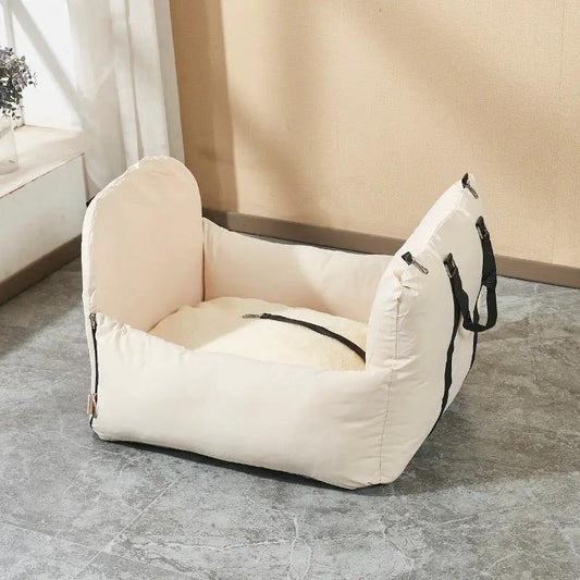 Outbound Travel Portable Car Pet Nest, cream-colored soft-sided car crate with handles