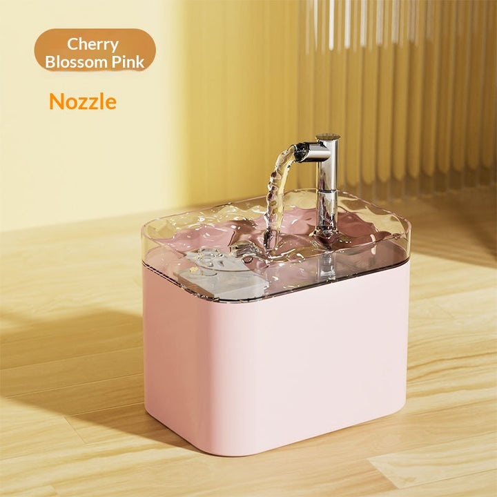 Pink standard fountain with faucet spout