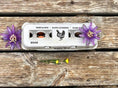 Load image into Gallery viewer, Egg carton by My Pet Chicken with Henlay Laid Local vintage print; eggs visible, purple flowers on wood background
