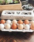 Load image into Gallery viewer, Egg cartons with a dozen brown and white eggs, featuring Happy Hens vintage design
