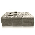 Load image into Gallery viewer, Egg cartons stacked in tiers with vintage print labels and visible EGGS text.
