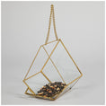Load image into Gallery viewer, Open Air Glass Bird House by GreaterGood; gold-tone geometric hanging terrarium with glass panels and a pebbled bottom
