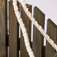 Load image into Gallery viewer, Hanging Bench Bird and Squirrel Feeder by GreaterGood, white twisted rope against dark wooden posts.
