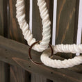 Load image into Gallery viewer, Hanging Bench Bird & Squirrel Feeder with white twisted rope and metal ring against brown wood backdrop
