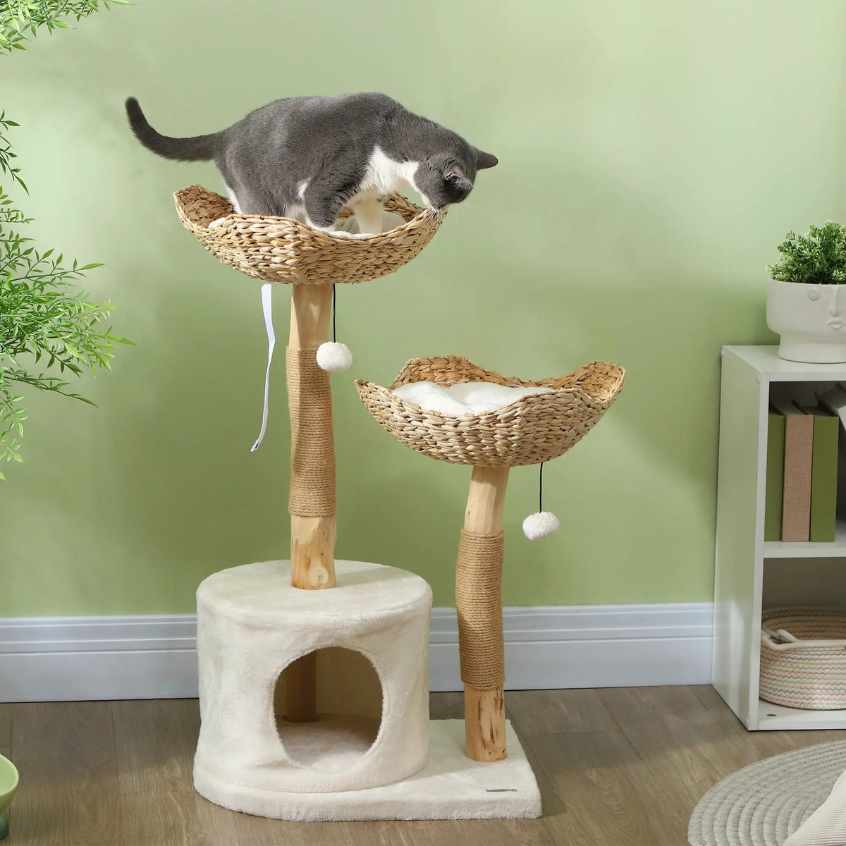 PawHut Woven Nest Cat Tree in Cream White with two basket beds, a lower hideaway, and a gray-and-white cat in the upper bed.