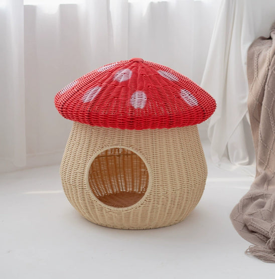 Red toadstool cat house with lid in place
