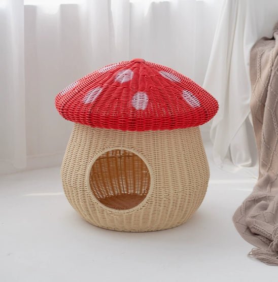 Red toadstool cat house with lid in place